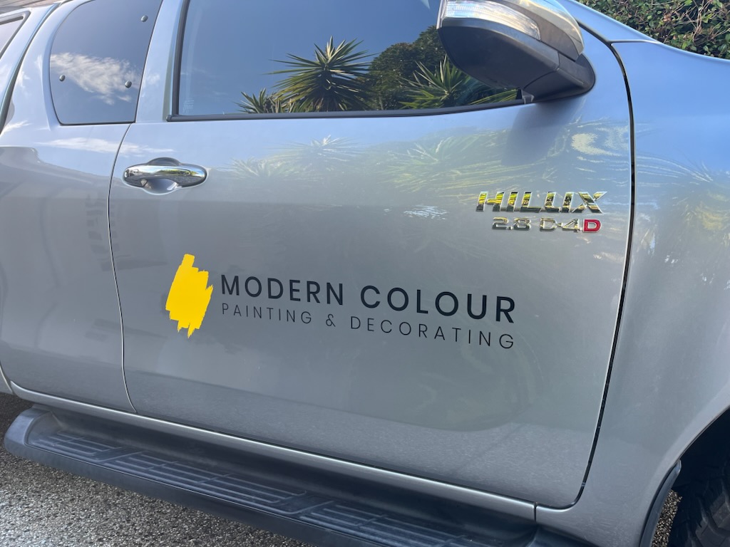 Coloured vinyl logo and lettering on a Sunshine Coast trade ute